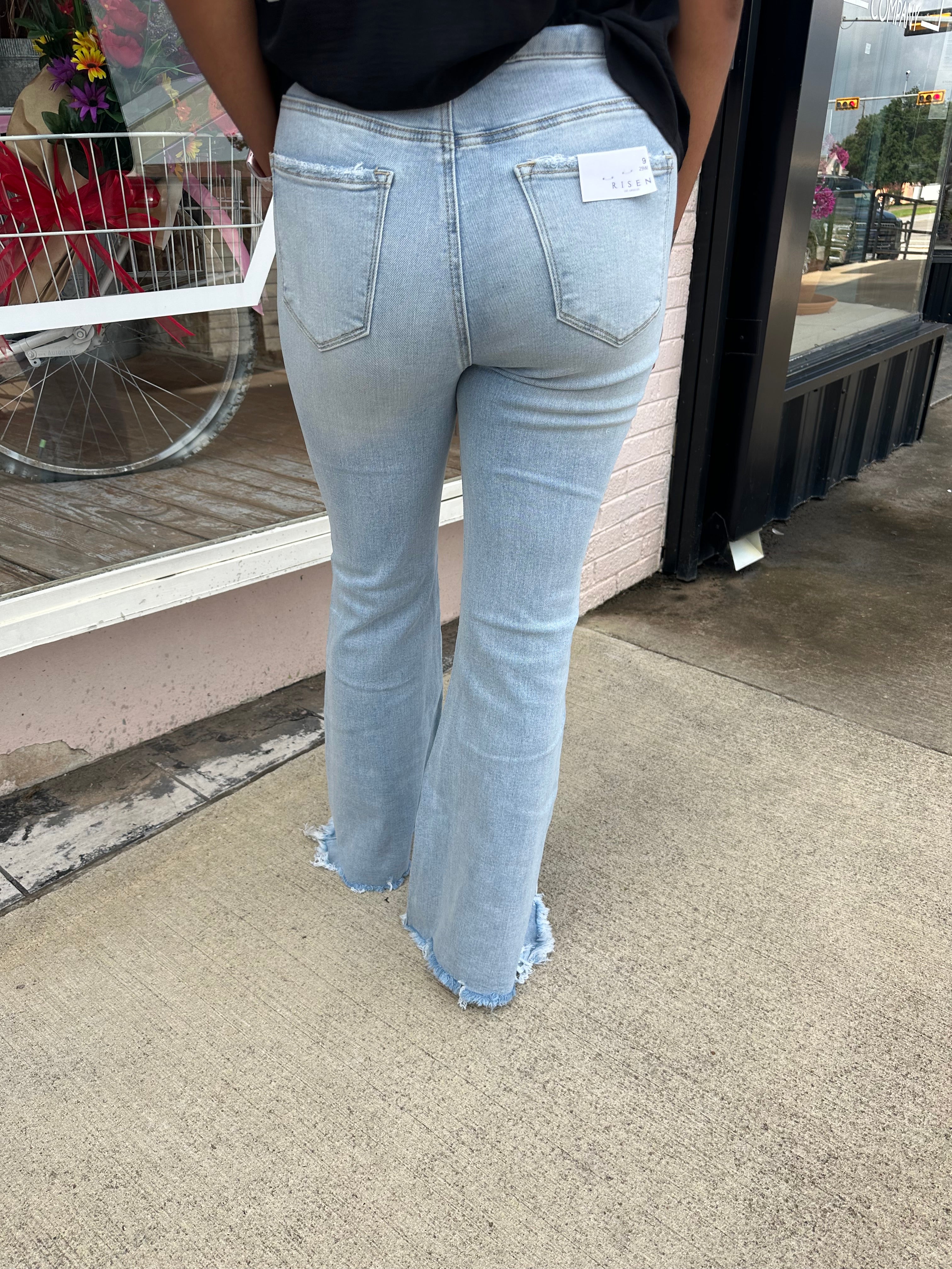 High Rise Wide Flare Step Hem Jean