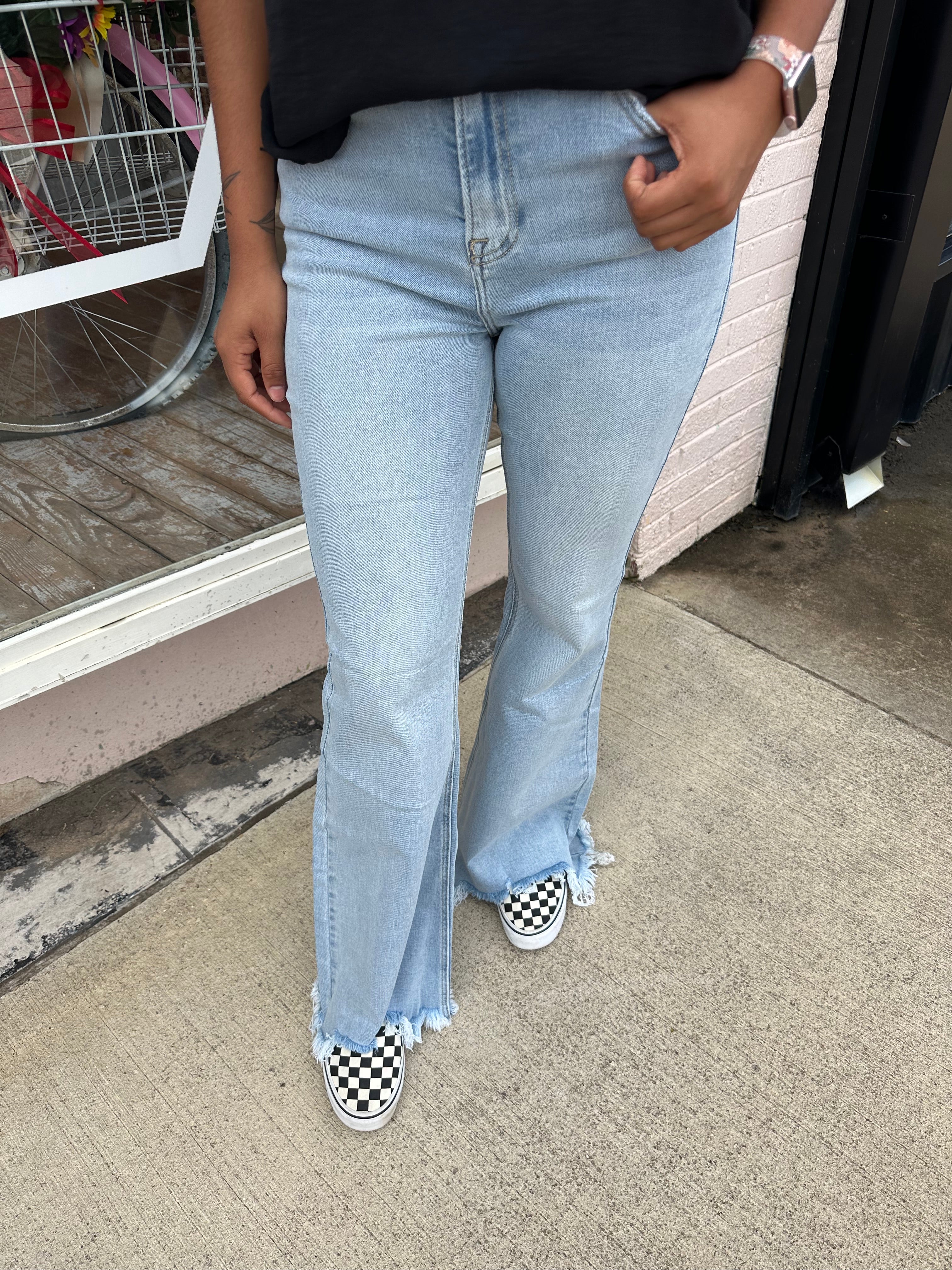 High Rise Wide Flare Step Hem Jean